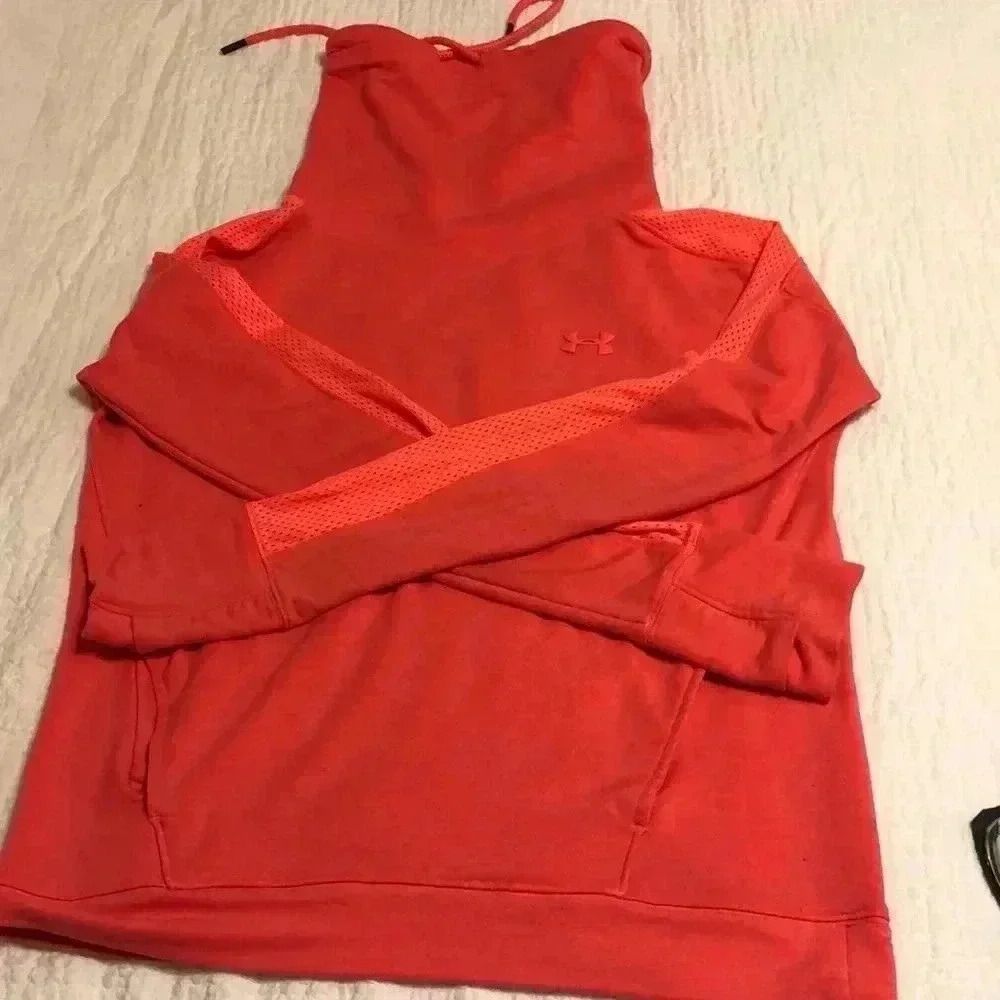 Under Armour pink long sleeve athletic top.  Size XS
